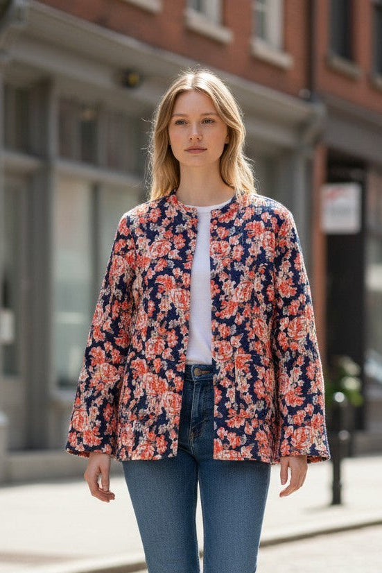 Model wearing Les Sûtras Cotton - Quilted Jacket Reversible- Blue with Pink Flowers