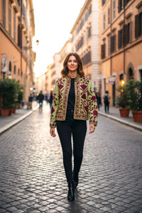 Model wearing Les Sûtras' Cotton Suzani Embroidered Jacket - Mint Green and Red