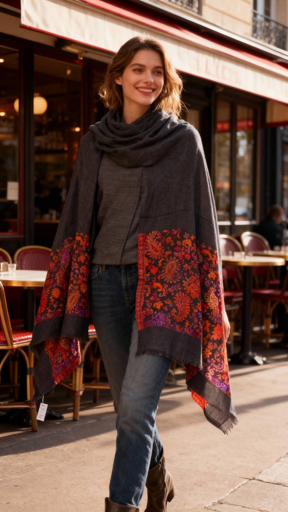 Model wearing Les Sûtras Fine Wool Scarf with Heritage Border – Black.