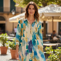 Model wearing a colorful Les Sûtras long cotton pintex  dress.