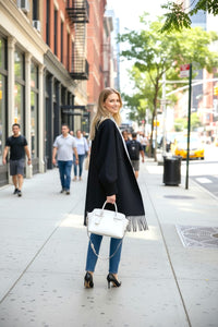 Reversible cape scarf with sleeves