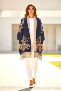 Reversible cape scarf with sleeves